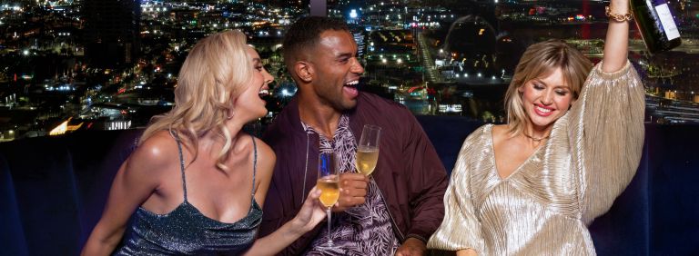 Friends Drinking at Legacy Club Las Vegas Rooftop Bar